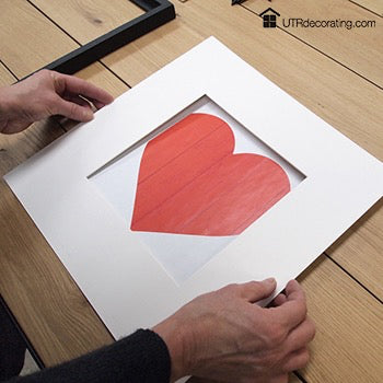 Picture hanging tip: lining up images with mats
